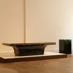 Abyssus 2 is a cast multi-coloured resin coffee table with a gilded textured core