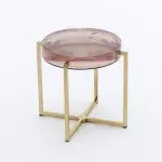 Pinky grey resin coffee table with brass legs